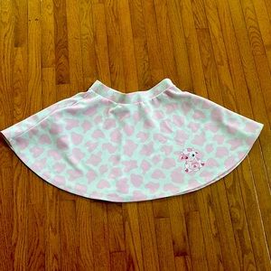 Strawberry cow print skirt.